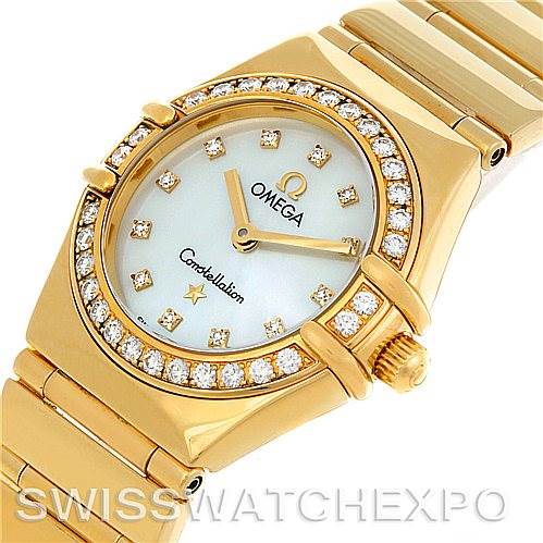 The image shows a top angle view of the Omega 1164.75.00 Women's Yellow Gold Mother of Pearl Dial 1164.75.00 Women's Yellow Gold Mother of Pearl Dial Constellation 18K Yellow Gold Diamond Mini 1164.75.00 watch, highlighting the dial and bezel.