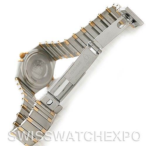 The image shows the Omega Women's Steel and Gold (two tone) White Dial Women's Steel and Gold (two tone) White Dial Constellation Mini Steel and Gold Diamond Watch from the back, highlighting the clasp and part of the bracelet.