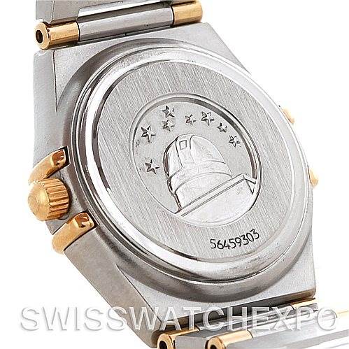 The image shows the stainless steel case back and part of the bracelet of the Omega Women's Steel and Gold (two tone) White Dial Women's Steel and Gold (two tone) White Dial Constellation Mini Steel and Gold Diamond Watch.