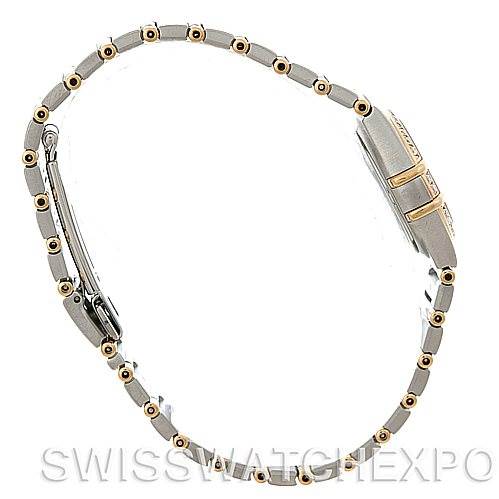 The image shows a side view of the Omega Women's Steel and Gold (two tone) White Dial Women's Steel and Gold (two tone) White Dial Constellation Mini Steel and Gold Diamond Watch, highlighting the band and clasp.