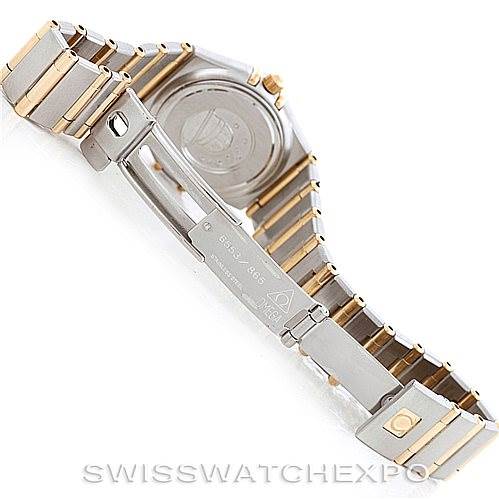This image shows the underside of the Omega 1267.70.00 Women
s Steel and Gold (two tone) Mother of Pearl Dial 1267.70.00 Women
s Steel and Gold (two tone) Mother of Pearl Dial Constellation My Choice Steel Gold Diamond Watch 1267.70.00, focusing on the clasp and case back.
