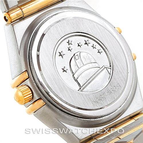 The image shows the back case of the Omega 1267.70.00 Women
s Steel and Gold (two tone) Mother of Pearl Dial 1267.70.00 Women
s Steel and Gold (two tone) Mother of Pearl Dial Constellation My Choice Steel Gold Diamond Watch 1267.70.00, featuring an observatory emblem.