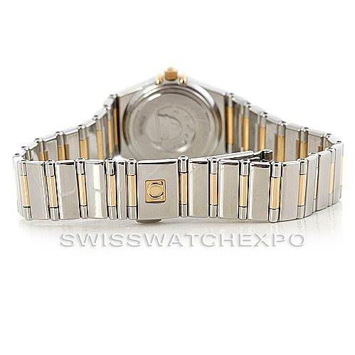 The image shows the back view of the Omega 1365.75.00 Women
s Steel and Gold (two tone) Mother of Pearl Dial 1365.75.00 Women
s Steel and Gold (two tone) Mother of Pearl Dial Ladies Constellation Diamond Mini 1365.75.00 watch, focusing on the bracelet and clasp.