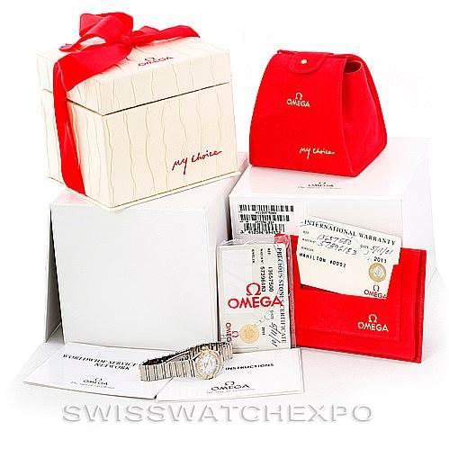 The image shows the Omega 1365.75.00 Women
s Steel and Gold (two tone) Mother of Pearl Dial 1365.75.00 Women
s Steel and Gold (two tone) Mother of Pearl Dial Ladies Constellation Diamond Mini 1365.75.00 watch, its packaging, warranty card, and accessory pouches.