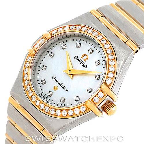 This image shows a close-up of the face and part of the bracelet of the Omega 123.25.24.60.55.003 Women
s Steel and Gold (two tone) Mother of Pearl Dial 123.25.24.60.55.003 Women
s Steel and Gold (two tone) Mother of Pearl Dial Constellation My Choice Steel Gold Diamond Watch 123.25.24.60.55.003.