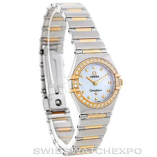 The image displays a Ladies Omega 1365.71.00 Women
s Steel and Gold (two tone) Mother of Pearl Dial 1365.71.00 Women
s Steel and Gold (two tone) Mother of Pearl Dial Constellation Diamond Mini 1365.71.00 watch angled from the front showing the face, bezel, and bracelet.