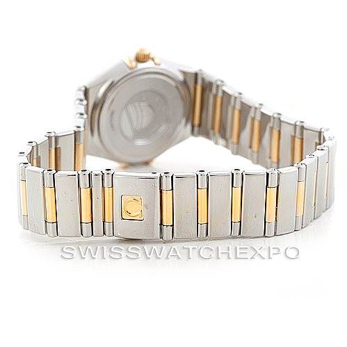 The image shows the back and a side angle of the bracelet of the Omega 1365.71.00 Women
s Steel and Gold (two tone) Mother of Pearl Dial 1365.71.00 Women
s Steel and Gold (two tone) Mother of Pearl Dial Constellation Diamond Mini 1365.71.00 watch.
