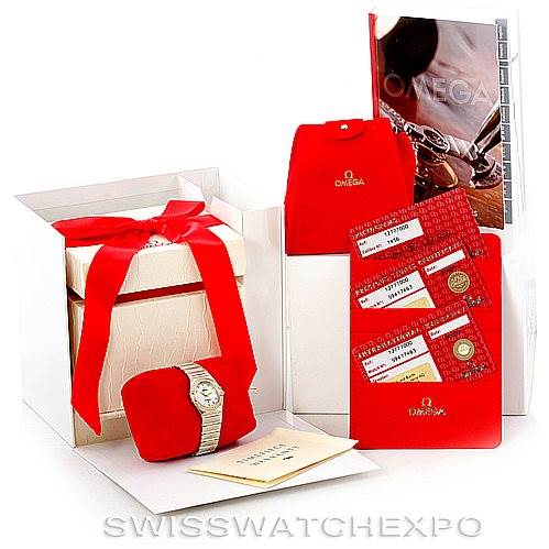 The image shows the Omega 1277.70.00 Women
s Steel and Gold (two tone) Mother of Pearl Dial 1277.70.00 Women
s Steel and Gold (two tone) Mother of Pearl Dial Constellation My Choice Steel Gold Diamond Watch 1277.70.00 model with its packaging, manuals, and warranty cards.