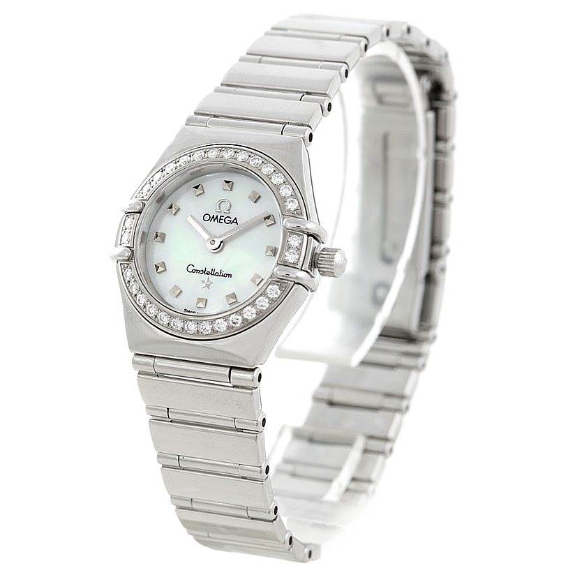 The image displays an Omega 1465.71.00 Women
s Stainless Steel Mother of Pearl Dial 1465.71.00 Women
s Stainless Steel Mother of Pearl Dial Constellation My Choice Ladies Diamond Mini Watch 1465.71.00 at a three-quarter angle, showing the face, bezel, and bracelet.