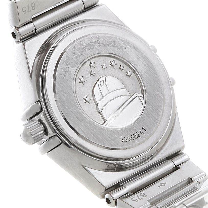 This image shows the back of the Omega 1465.71.00 Women
s Stainless Steel Mother of Pearl Dial 1465.71.00 Women
s Stainless Steel Mother of Pearl Dial Constellation My Choice Ladies Diamond Mini Watch 1465.71.00, highlighting its engraved case.