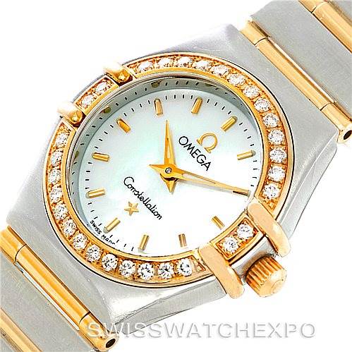 The image shows a close-up view of the Omega 1267.70.00 Women
s Steel and Gold (two tone) Mother of Pearl Dial 1267.70.00 Women
s Steel and Gold (two tone) Mother of Pearl Dial Constellation Ladies Diamond Mini Watch 1267.70.00, highlighting the dial, bezel, and part of the bracelet.