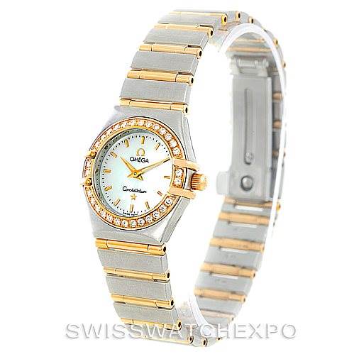 The image shows an Omega 1267.70.00 Women
s Steel and Gold (two tone) Mother of Pearl Dial 1267.70.00 Women
s Steel and Gold (two tone) Mother of Pearl Dial Constellation Ladies Diamond Mini Watch 1267.70.00 from an angled view, highlighting the face, bracelet, and bezel.
