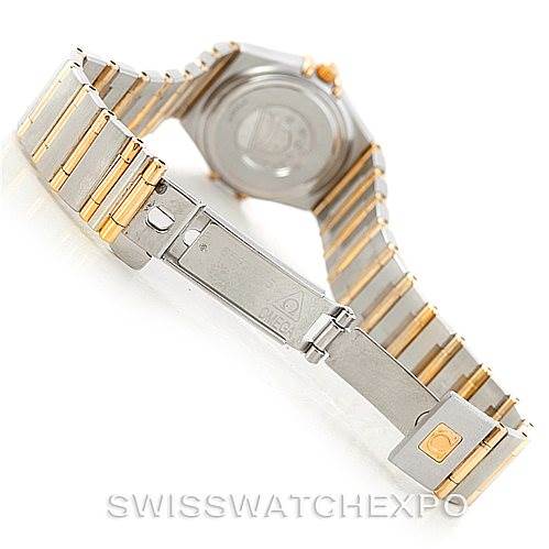 The image shows the Omega 1267.70.00 Women
s Steel and Gold (two tone) Mother of Pearl Dial 1267.70.00 Women
s Steel and Gold (two tone) Mother of Pearl Dial Constellation Ladies Diamond Mini Watch 1267.70.00 from a rear angle, highlighting the clasp and bracelet underside.