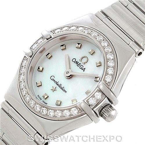 The image shows the Omega 1465.71.00 Women
s Stainless Steel Mother of Pearl Dial 1465.71.00 Women
s Stainless Steel Mother of Pearl Dial Constellation My Choice Ladies Mini Watch 1465.71.00 from an angle displaying the face, bezel, and part of the bracelet.