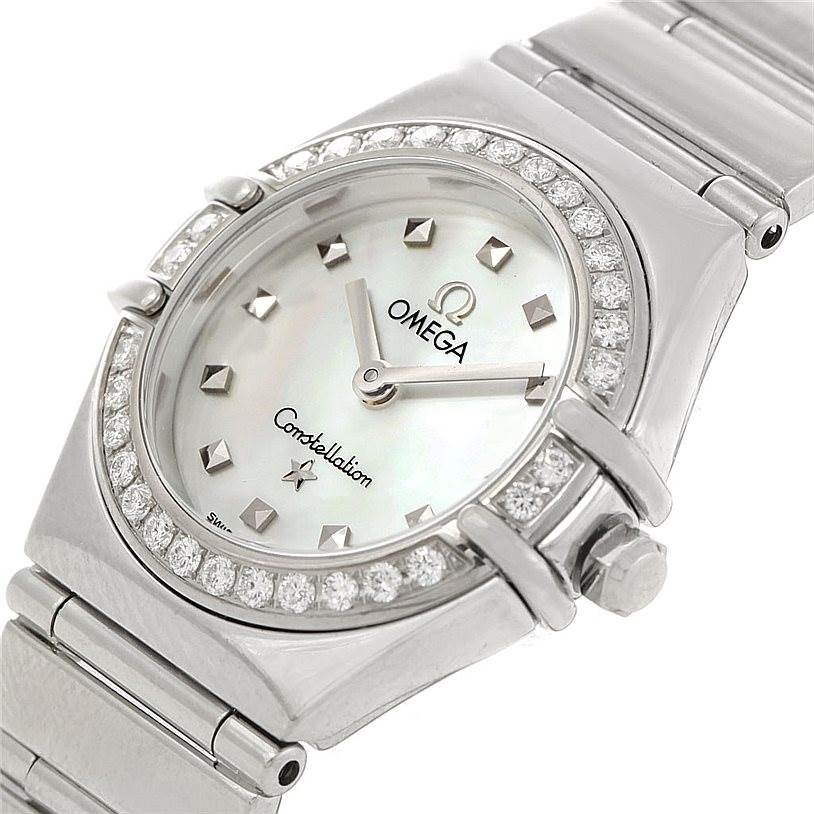 The image shows the face and part of the band of the Omega 1465.71.00 Women
s Stainless Steel Mother of Pearl Dial 1465.71.00 Women
s Stainless Steel Mother of Pearl Dial Constellation My Choice Ladies Mini Diamond Watch 1465.71.00 at a slight angle.