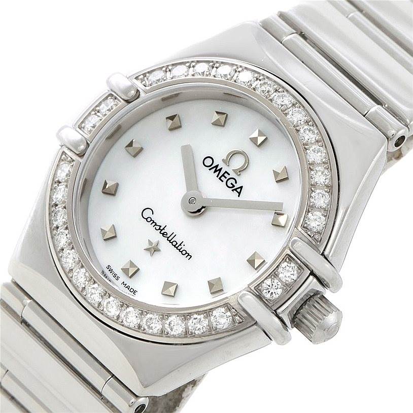 The image shows a close-up of the face and upper strap of the Omega 1465.71.00 Women
s Stainless Steel Mother of Pearl Dial 1465.71.00 Women
s Stainless Steel Mother of Pearl Dial Constellation My Choice Ladies Diamond Mini Watch 1465.71.00.