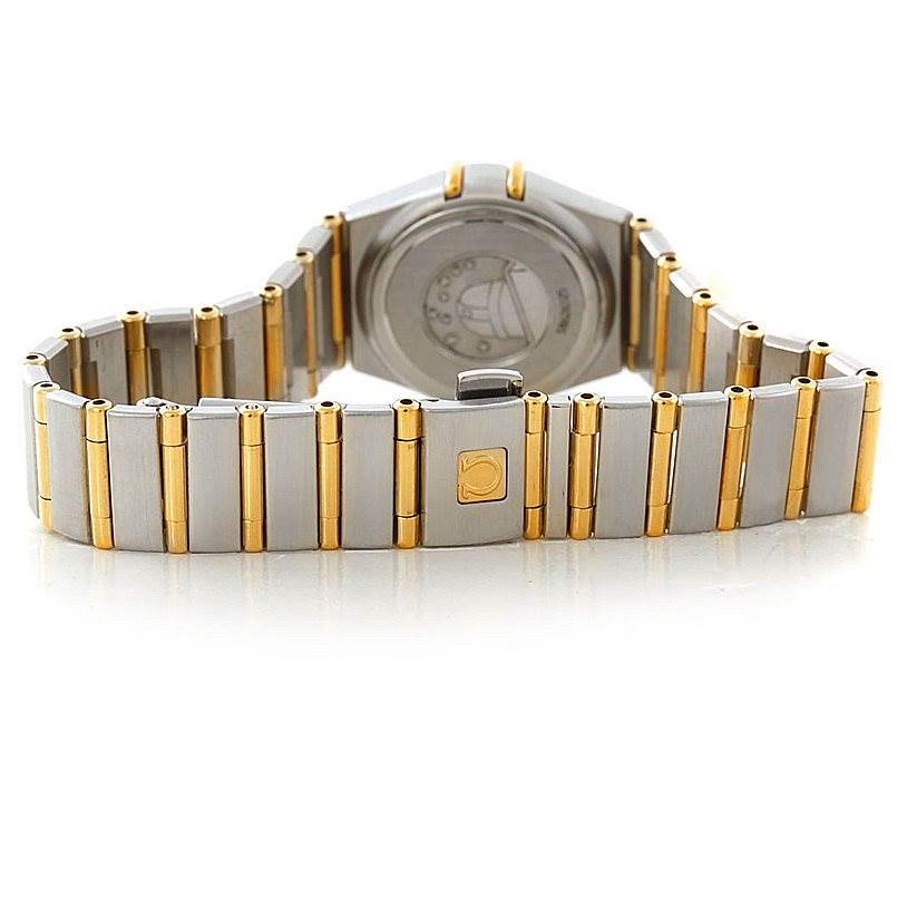 The image shows the back side and bracelet of the Omega 1267.70.00 Women
s Steel and Gold (two tone) Mother of Pearl Dial 1267.70.00 Women
s Steel and Gold (two tone) Mother of Pearl Dial Constellation Ladies Diamond Mini Watch 1267.70.00 with a two-tone design.