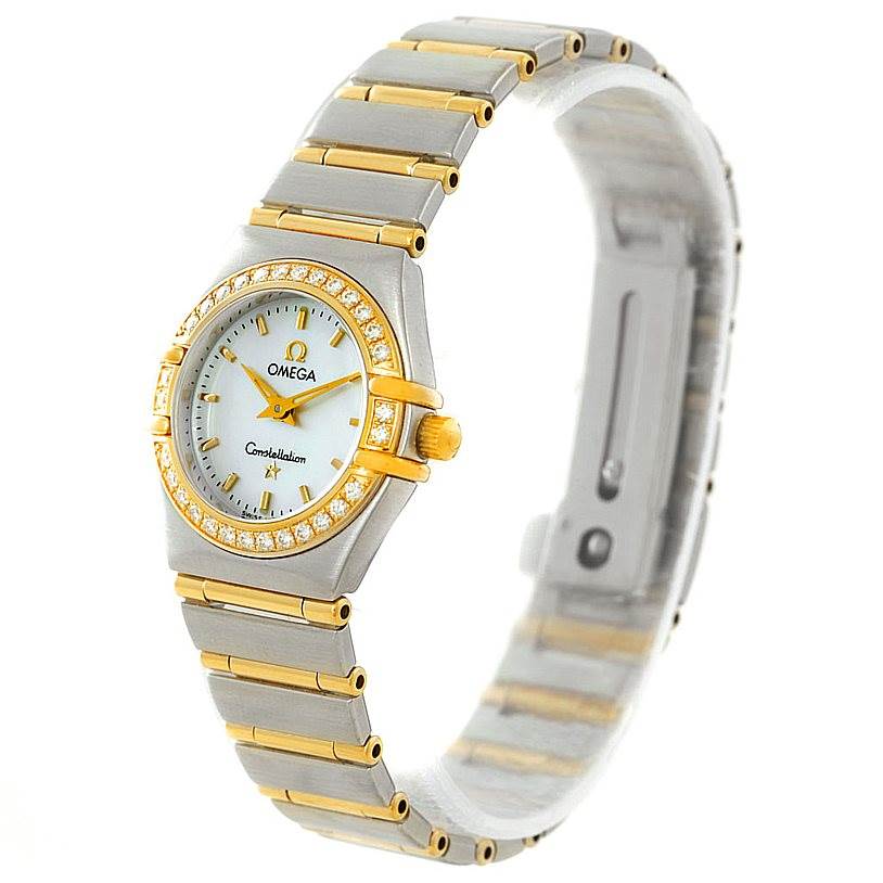 The Omega 1267.70.00 Women
s Steel and Gold (two tone) Mother of Pearl Dial 1267.70.00 Women
s Steel and Gold (two tone) Mother of Pearl Dial Constellation Ladies Diamond Mini Watch 1267.70.00 is shown at an angle emphasizing its bracelet, bezel, and dial.