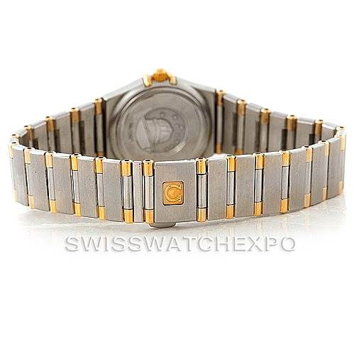 The image shows the back view of the Omega 1372.70.00 Women
s Steel and Gold (two tone) Mother of Pearl Dial 1372.70.00 Women
s Steel and Gold (two tone) Mother of Pearl Dial Constellation Steel and Gold Ladies Watch 1372.70.00, focusing on its bracelet and clasp.