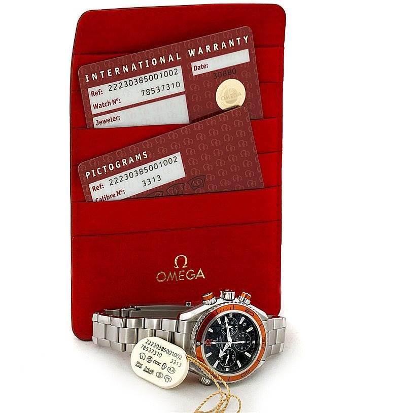 The image shows an Omega 222.30.38.50.01.002 Women
s Stainless Steel Black Dial 222.30.38.50.01.002 Women
s Stainless Steel Black Dial Seamaster Planet Ocean Ladies Watch 222.30.38.50.01.002 with warranty and pictogram cards.