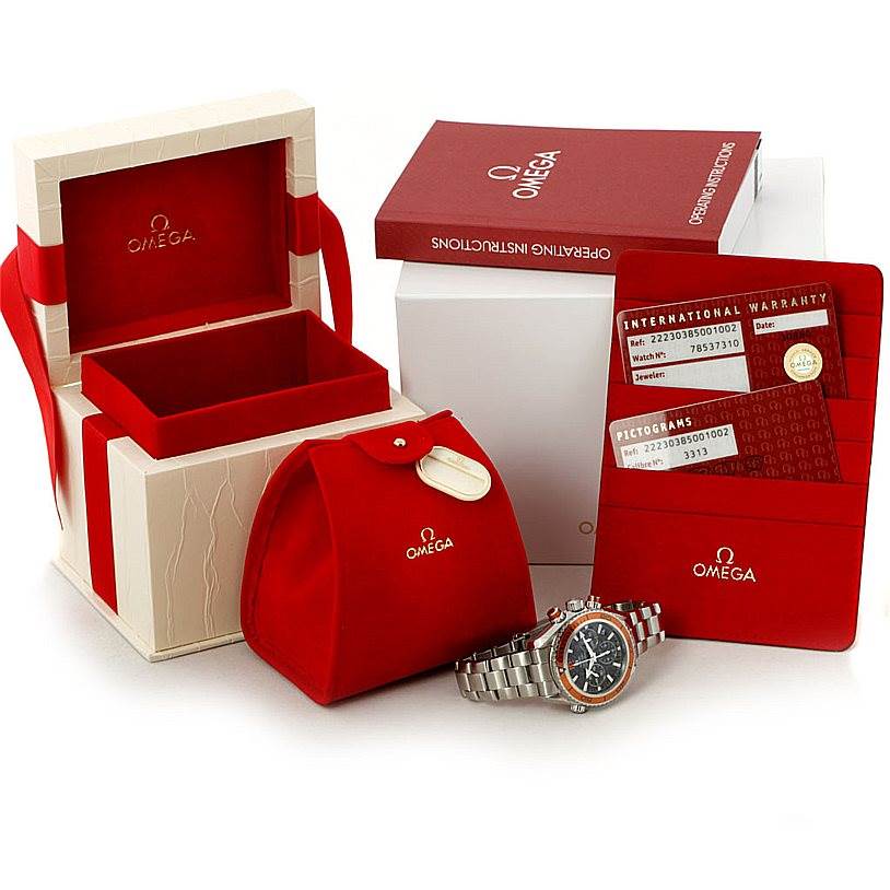 This image shows the Omega 222.30.38.50.01.002 Women
s Stainless Steel Black Dial 222.30.38.50.01.002 Women
s Stainless Steel Black Dial Seamaster Planet Ocean Ladies Watch model 222.30.38.50.01.002 with its box, manual, and warranty card from a front angle.