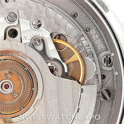This image shows a close-up view of the movement mechanism in the Omega 3834.70.36 Women
s Stainless Steel Mother of Pearl Dial 3834.70.36 Women
s Stainless Steel Mother of Pearl Dial Speedmaster Ladies MOP Dial Watch 3834.70.36.