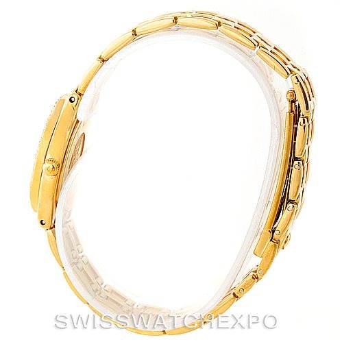 This image shows a side view of the Omega Women's Yellow Gold Champagne Dial Women's Yellow Gold Champagne Dial DeVille Ladies 18K Yellow Gold Diamond Watch, highlighting its bracelet and case.