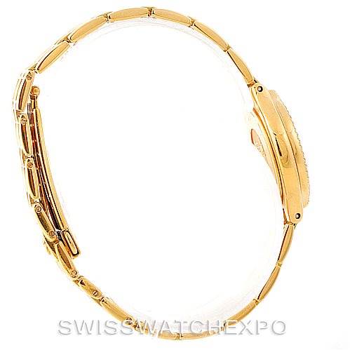 This side view image shows the band and case of the Omega Women's Yellow Gold Champagne Dial Women's Yellow Gold Champagne Dial DeVille Ladies 18K Yellow Gold Diamond Watch.