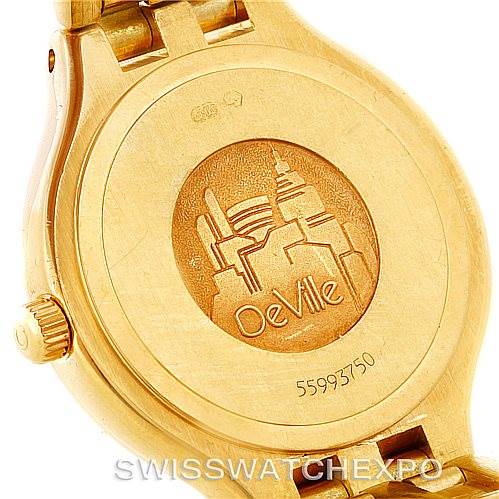 The image shows the back case of the Omega Women's Yellow Gold Champagne Dial Women's Yellow Gold Champagne Dial DeVille Ladies 18K Yellow Gold Diamond Watch from a close-up angle.