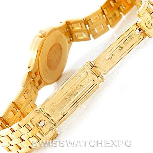 The image shows the back and clasp of the Omega Women's Yellow Gold Champagne Dial Women's Yellow Gold Champagne Dial DeVille Ladies 18K Yellow Gold Diamond Watch.