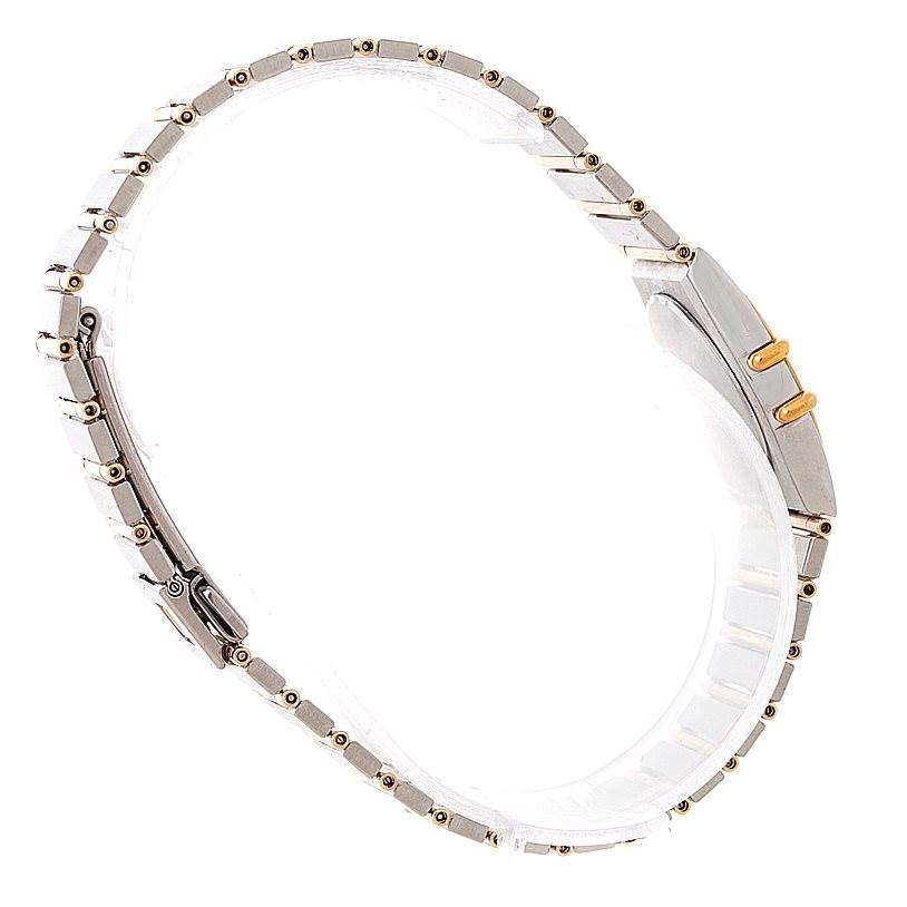 The image shows a side view of the Omega Women
s Steel and Gold (two tone) Champagne Dial Women
s Steel and Gold (two tone) Champagne Dial Constellation Mini Steel 18K Yellow Gold Diamond Watch, focusing on the bracelet and clasp.
