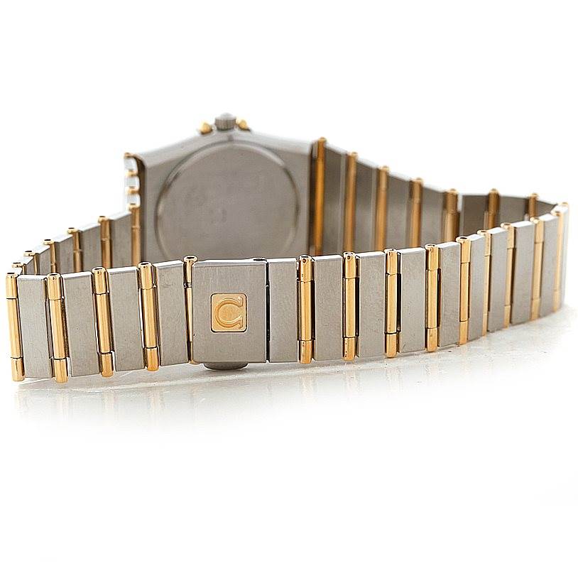 This image shows the back view of the bracelet and clasp of the Omega Women
s Steel and Gold (two tone) Champagne Dial Women
s Steel and Gold (two tone) Champagne Dial Constellation Mini Steel 18K Yellow Gold Diamond Watch.