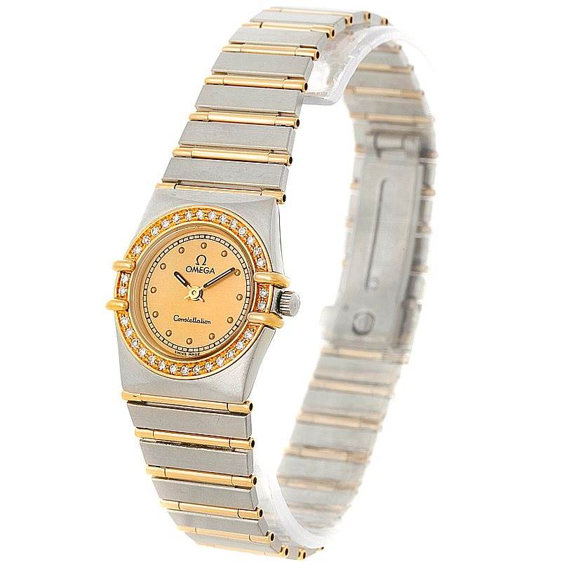 This image shows an Omega Women
s Steel and Gold (two tone) Champagne Dial Women
s Steel and Gold (two tone) Champagne Dial Constellation Mini Steel 18K Yellow Gold Diamond Watch at an angled view highlighting the face and bracelet.