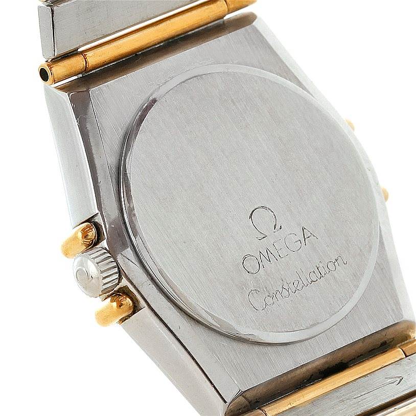 The image shows the back case and part of the bracelet of the Omega Women
s Steel and Gold (two tone) Champagne Dial Women
s Steel and Gold (two tone) Champagne Dial Constellation Mini Steel 18K Yellow Gold Diamond Watch.