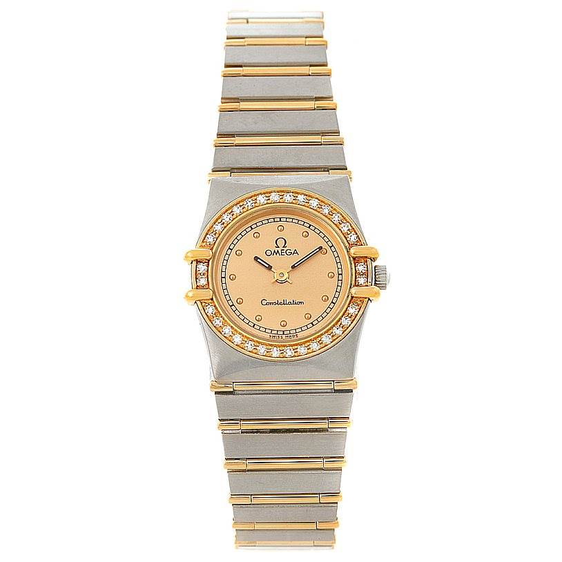 The image shows the full front view of the Omega Women
s Steel and Gold (two tone) Champagne Dial Women
s Steel and Gold (two tone) Champagne Dial Constellation Mini Steel 18K Yellow Gold Diamond Watch, highlighting the watch face and band.
