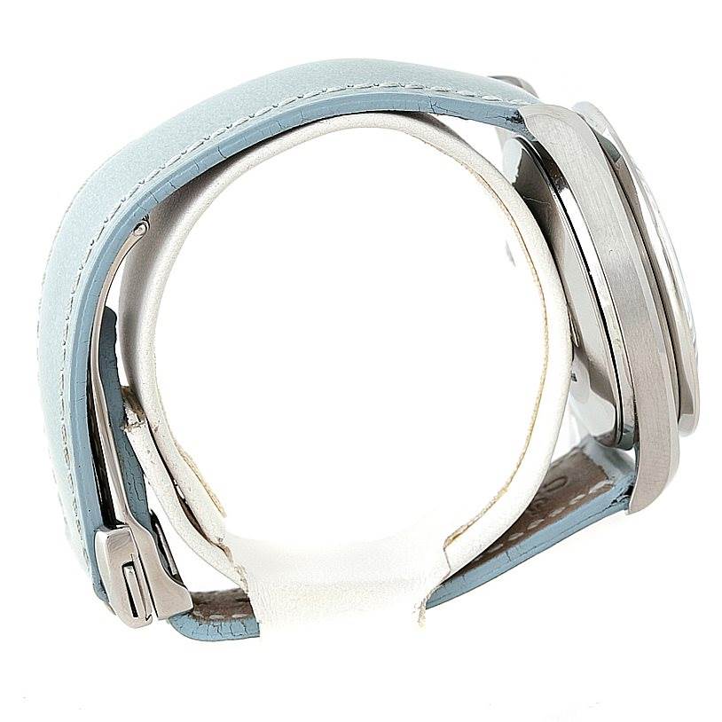 This image shows a side view of an Omega 3815.71.53 Women
s Stainless Steel Mother of Pearl Dial 3815.71.53 Women
s Stainless Steel Mother of Pearl Dial Speedmaster Ladies Diamond MOP Dial Watch 3815.71.53, highlighting its case and light blue strap.