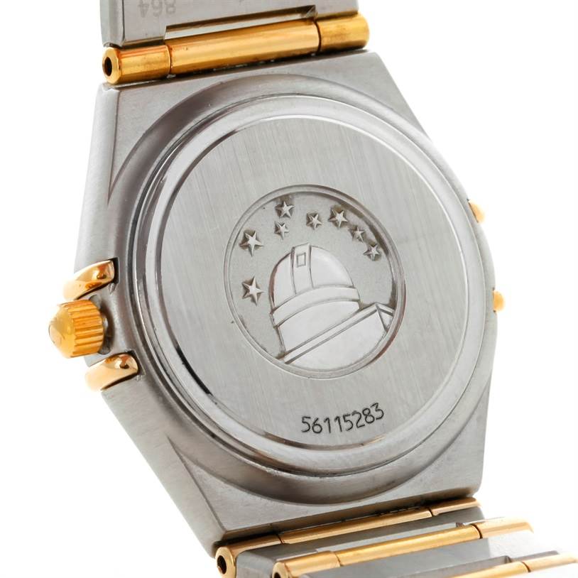 The image shows the back and part of the bracelet of the Omega 1277.70.00 Women
s Steel and Gold (two tone) Mother of Pearl Dial 1277.70.00 Women
s Steel and Gold (two tone) Mother of Pearl Dial Constellation My Choice Steel Gold Diamond Watch 1277.70.00.