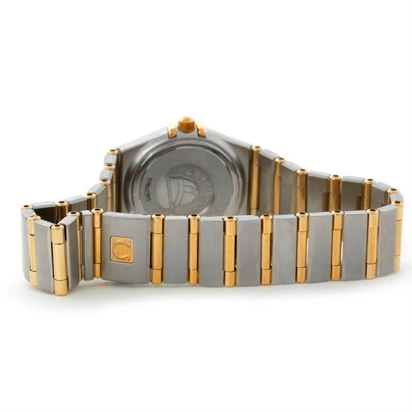 The image shows the back and bracelet of the Omega 1267.75.00 Women
s Steel and Gold (two tone) Mother of Pearl Dial 1267.75.00 Women
s Steel and Gold (two tone) Mother of Pearl Dial Constellation My Choice Steel Gold Diamond Watch 1267.75.00 model.