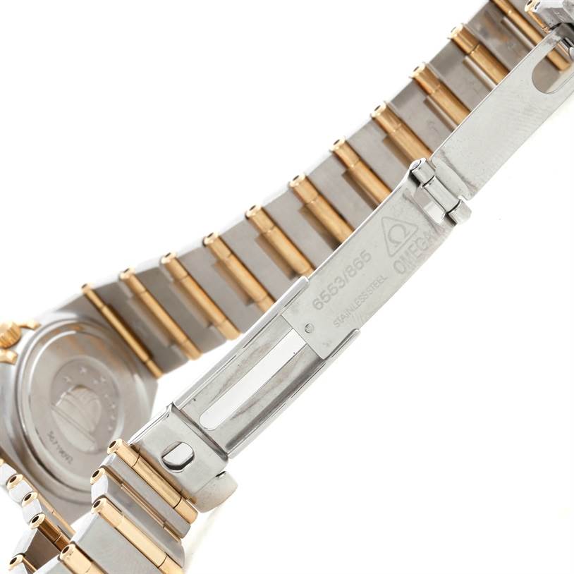 The image shows the back and partially open clasp of the Omega 1267.75.00 Women
s Steel and Gold (two tone) Mother of Pearl Dial 1267.75.00 Women
s Steel and Gold (two tone) Mother of Pearl Dial Constellation My Choice Steel Gold Diamond Watch 1267.75.00.