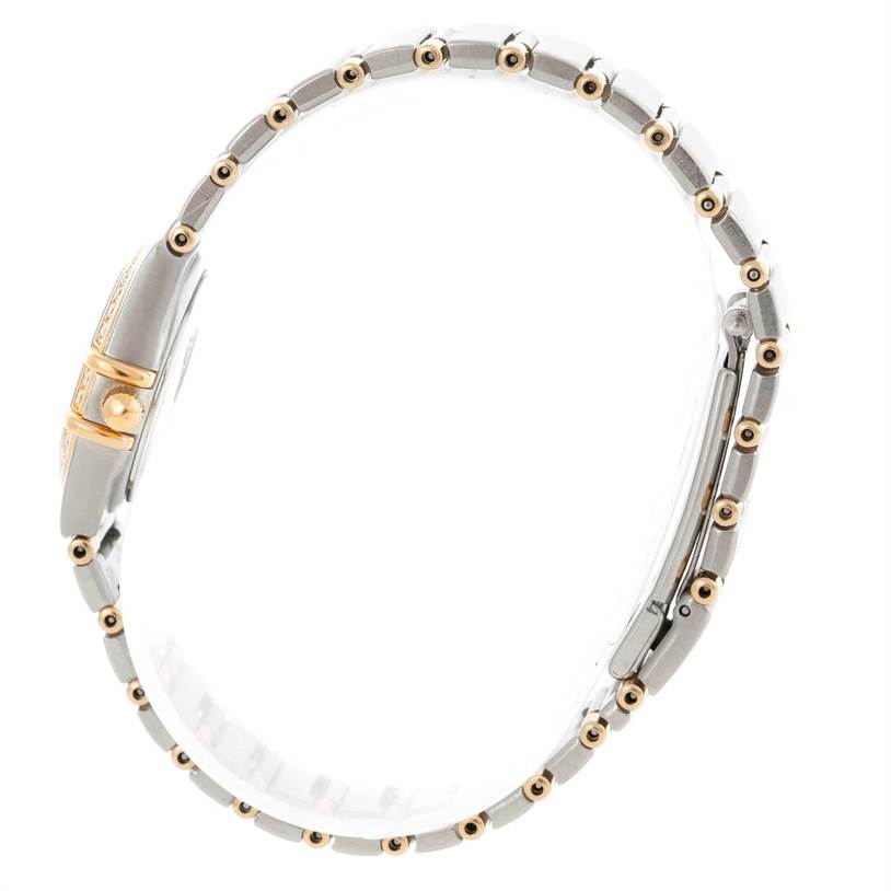 The image shows a side angle of the Omega 56945066 Women
s Steel and Gold (two tone) Mother of Pearl Dial 56945066 Women
s Steel and Gold (two tone) Mother of Pearl Dial Constellation Mini Steel and Gold Diamond Watch, highlighting the bracelet and part of the clasp.