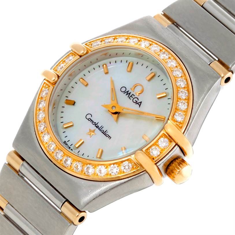 This image shows a close-up view of the Omega 56945066 Women
s Steel and Gold (two tone) Mother of Pearl Dial 56945066 Women
s Steel and Gold (two tone) Mother of Pearl Dial Constellation Mini Steel and Gold Diamond Watch, focusing on the face and part of the bracelet.