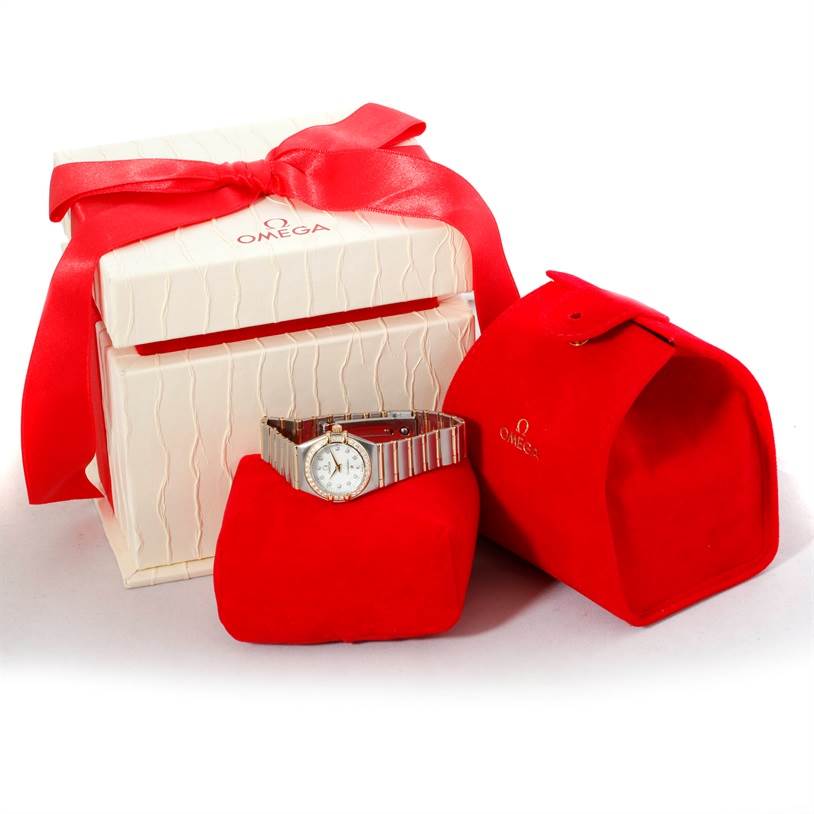 The Omega 1267.75.00 Women
s Steel and Gold (two tone) Mother of Pearl Dial 1267.75.00 Women
s Steel and Gold (two tone) Mother of Pearl Dial Constellation My Choice Steel Gold Diamond Watch 1267.75.00 is shown in front view with its box and red packaging.