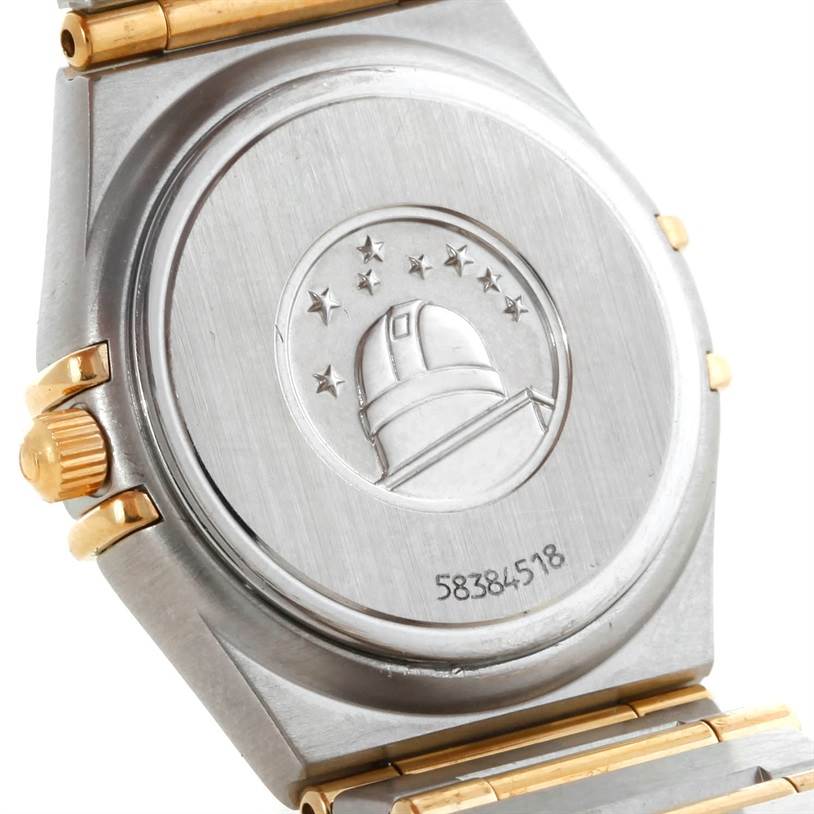 The image shows the back case of the Omega 1277.75.00 Women
s Steel and Gold (two tone) Mother of Pearl Dial 1277.75.00 Women
s Steel and Gold (two tone) Mother of Pearl Dial Constellation My Choice Steel Gold Diamond Watch 1277.75.00 model.