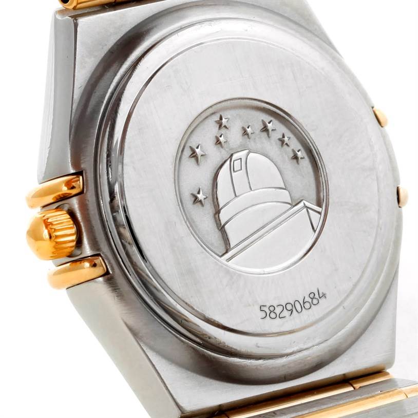 The image shows the back case and crown of the Omega 1277.70.00 Women
s Steel and Gold (two tone) Mother of Pearl Dial 1277.70.00 Women
s Steel and Gold (two tone) Mother of Pearl Dial Constellation My Choice Steel Gold Diamond Watch 1277.70.00 model.