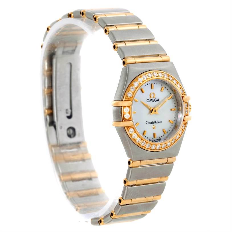 The image shows an angled view of the Omega 1267.70.00 Women
s Steel and Gold (two tone) Mother of Pearl Dial 1267.70.00 Women
s Steel and Gold (two tone) Mother of Pearl Dial Constellation My Choice Mini Steel Gold Diamond Watch 1267.70.00, highlighting its face and bracelet.
