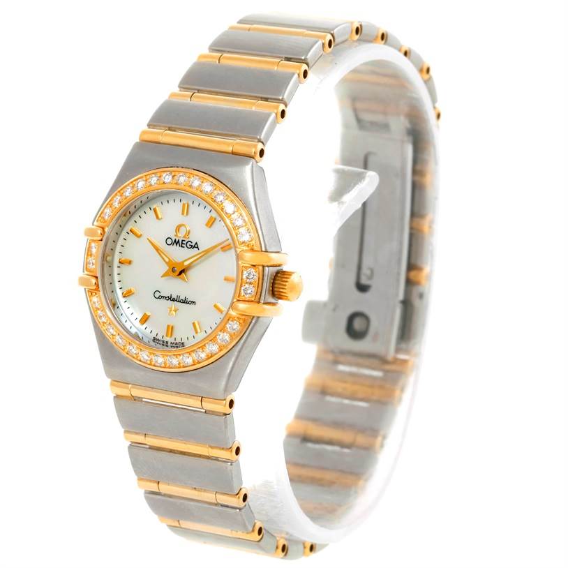 The image shows an angled view of an Omega 1267.70.00 Women
s Steel and Gold (two tone) Mother of Pearl Dial 1267.70.00 Women
s Steel and Gold (two tone) Mother of Pearl Dial Constellation My Choice Mini Steel Gold Diamond Watch 1267.70.00, displaying the face and bracelet.