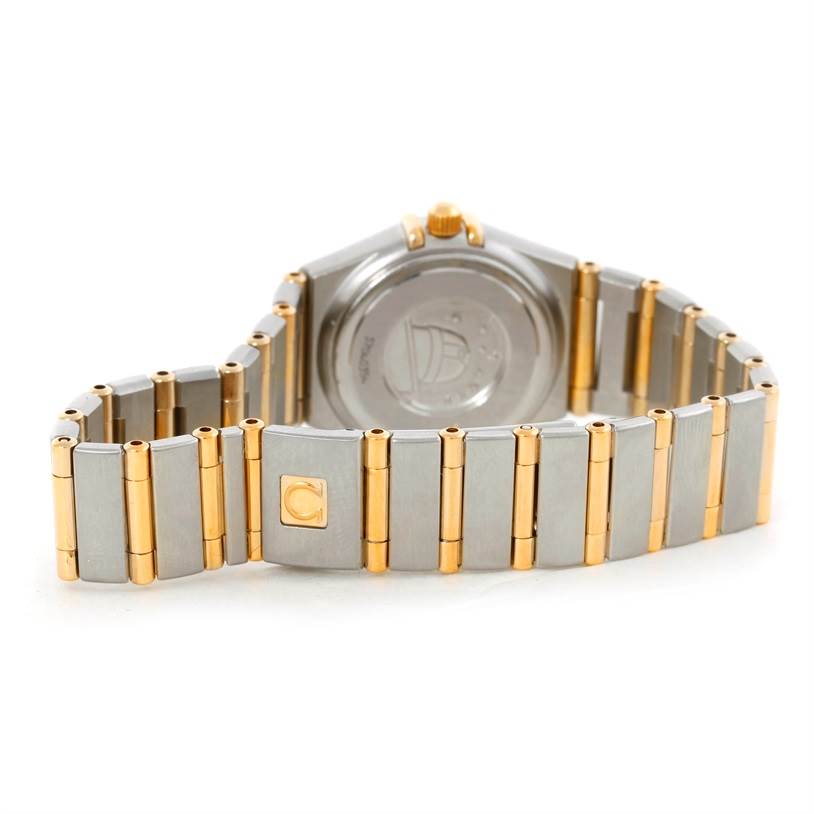 This image shows the back view and bracelet of the Omega 1267.70.00 Women
s Steel and Gold (two tone) Mother of Pearl Dial 1267.70.00 Women
s Steel and Gold (two tone) Mother of Pearl Dial Constellation My Choice Mini Steel Gold Diamond Watch 1267.70.00.
