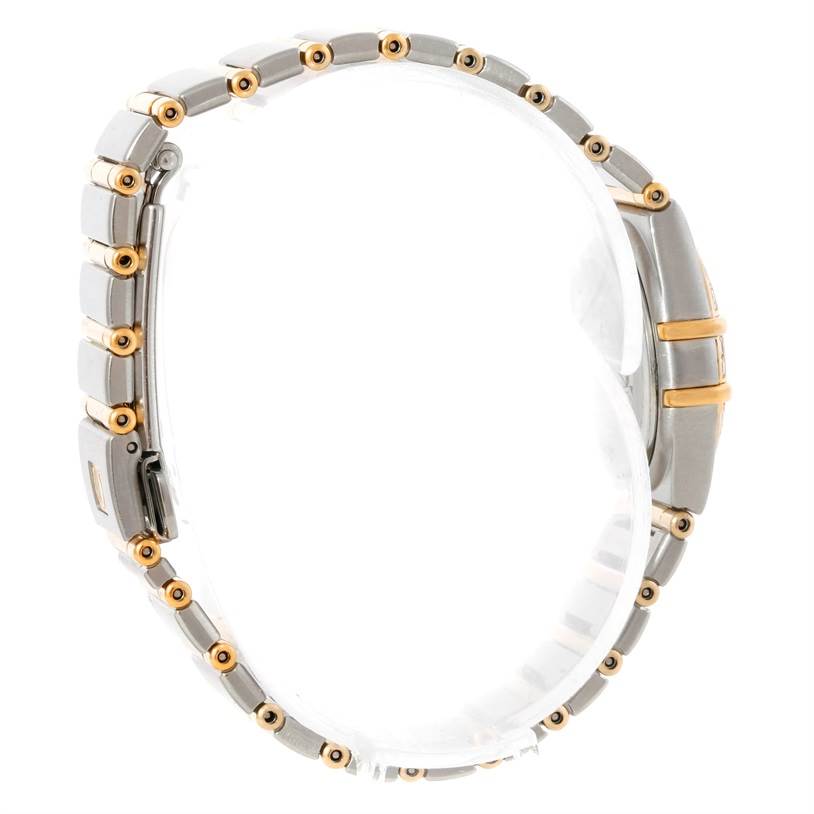 The image shows a side view of the Omega 1267.70.00 Women
s Steel and Gold (two tone) Mother of Pearl Dial 1267.70.00 Women
s Steel and Gold (two tone) Mother of Pearl Dial Constellation My Choice Mini Steel Gold Diamond Watch 1267.70.00, focusing on the bracelet and clasp.