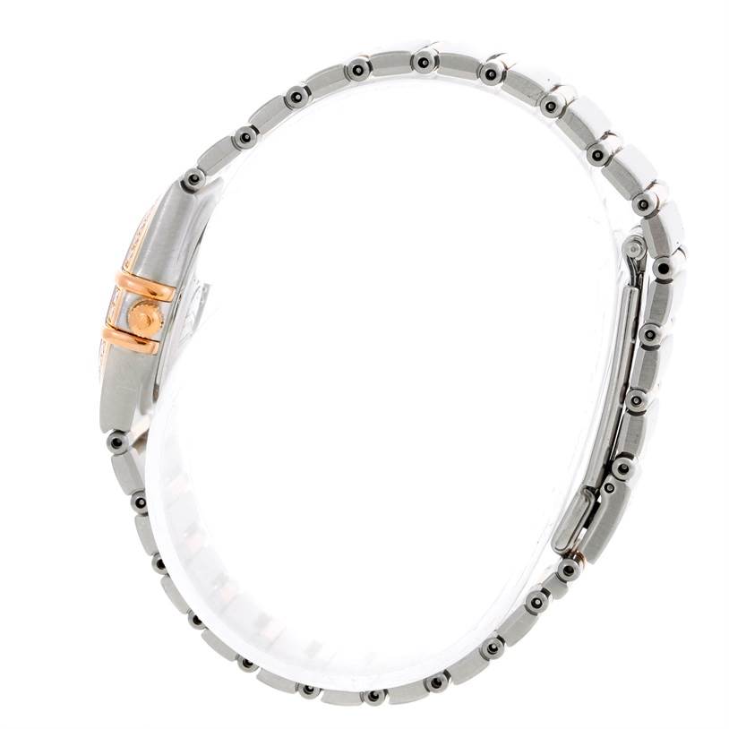 This image shows a side view of the Omega 1360.75.00 Women
s Steel and Gold (two tone) Mother of Pearl Dial 1360.75.00 Women
s Steel and Gold (two tone) Mother of Pearl Dial Constellation My Choice Mini Diamond Watch 1360.75.00, highlighting its band and crown.