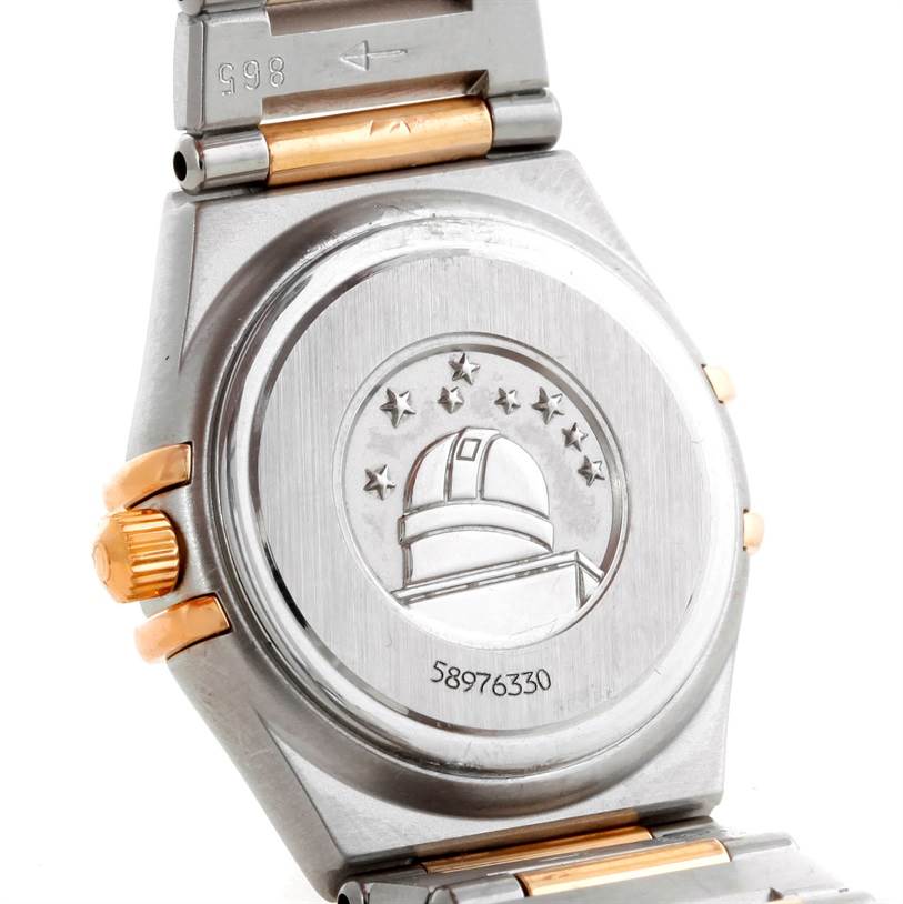 This image shows the back case of an Omega 1360.75.00 Women
s Steel and Gold (two tone) Mother of Pearl Dial 1360.75.00 Women
s Steel and Gold (two tone) Mother of Pearl Dial Constellation My Choice Mini Diamond Watch 1360.75.00.